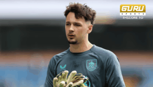 เจมส์ แทร็ฟฟอร์ด กลับต้องเผชิญกับสถานการณ์ที่ยากลำบากในการเบียดแย่งตำแหน่งท่ามกลางการมาถึงของยอดนายทวารระดับโลก